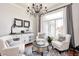 Sitting room with neutral tones, accent furniture, and a large window at 6940 Mockernut Ct, Plainfield, IN 46168
