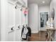 Functional mudroom with coat hooks, storage and bench at 6940 Mockernut Ct, Plainfield, IN 46168
