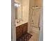Bathroom featuring a vanity with sink and a shower-tub with sliding glass doors at 6956 Park Square Dr # D, Avon, IN 46123