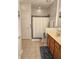 Bathroom featuring a toilet, shower with white shower curtain and a wooden vanity at 6956 Park Square Dr # D, Avon, IN 46123