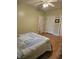 Bedroom featuring bed and multiple doors to other rooms at 6956 Park Square Dr # D, Avon, IN 46123