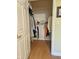 Bedroom closet with hanging clothes and shelved storage at 6956 Park Square Dr # D, Avon, IN 46123