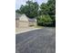 Spacious brick home with a large driveway and beautifully landscaped front yard and mature trees at 6956 Park Square Dr # D, Avon, IN 46123
