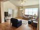 Inviting living room with wood flooring, vaulted ceilings and comfortable seating area at 6956 Park Square Dr # D, Avon, IN 46123