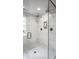 Elegant glass enclosed marble shower featuring dual shower heads and a window for natural light at 7105 Sylvan Ridge Rd, Indianapolis, IN 46240