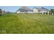 Large backyard with lush lawn and plenty of space at 7329 Birch Leaf Dr, Indianapolis, IN 46259