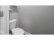 Bathroom with a toilet and gray walls at 7329 Birch Leaf Dr, Indianapolis, IN 46259