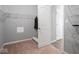 Walk-in closet with carpet and shelving at 7329 Birch Leaf Dr, Indianapolis, IN 46259