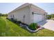 Beautiful white brick home with well-maintained lawn and landscaping at 7329 Birch Leaf Dr, Indianapolis, IN 46259