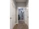 Hallway leading to the laundry and utility room at 7329 Birch Leaf Dr, Indianapolis, IN 46259