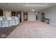 Spacious living room with an open floorplan to the kitchen and recessed lighting at 7329 Birch Leaf Dr, Indianapolis, IN 46259