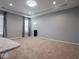 The main bedroom has recessed lighting, neutral paint, and carpeted floors at 7329 Birch Leaf Dr, Indianapolis, IN 46259
