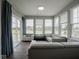 Sunroom with bright natural light and sliders overlooking the yard at 7329 Birch Leaf Dr, Indianapolis, IN 46259