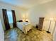 Bedroom with laminate flooring, dark wood dresser and natural lighting at 7611 Cloudy Ct, Camby, IN 46113