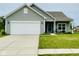 Charming single Gathering home with a two-car garage, manicured lawn, and quaint front porch at 7611 Cloudy Ct, Camby, IN 46113