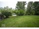 Large grassy backyard offers space for recreation, with a fenced perimeter providing privacy and security at 7657 Wheatgrass Ln, Noblesville, IN 46062