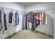 Walk-in closet with ample hanging space, ideal for organizing clothes and accessories at 7657 Wheatgrass Ln, Noblesville, IN 46062