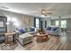 Comfortable living room with hardwood floors, neutral walls, and stylish decor at 7657 Wheatgrass Ln, Noblesville, IN 46062