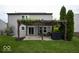 This home features a cozy patio area, complete with a pergola, ideal for outdoor relaxation and entertaining at 7657 Wheatgrass Ln, Noblesville, IN 46062