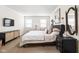 This bedroom offers lots of light, cozy decor, and stylish accents to create a welcoming space at 8436 N Meridian St, Indianapolis, IN 46260