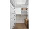 Walk-in closet with custom shelving, drawers, and ample storage space at 8436 N Meridian St, Indianapolis, IN 46260