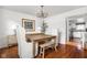 Elegant dining room featuring a wooden table and modern accents at 8436 N Meridian St, Indianapolis, IN 46260