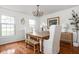 Elegant dining room with hardwood floors and contemporary chandelier at 8436 N Meridian St, Indianapolis, IN 46260