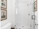 Modern shower boasts subway tile surround, glass enclosure, and sleek fixtures at 8436 N Meridian St, Indianapolis, IN 46260