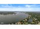 Stunning aerial view of the lake and surrounding homes, showing the area's natural beauty and waterfront community at 8712 Admirals Bay Dr, Indianapolis, IN 46236