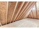 Unfinished attic space exposing the beams and floor for a clean and clear image at 8712 Admirals Bay Dr, Indianapolis, IN 46236