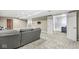 Basement space featuring a comfortable seating area and access to another room at 8712 Admirals Bay Dr, Indianapolis, IN 46236