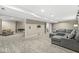 Finished basement offering a lounge area, TV hookups, and modern, neutral-toned decor at 8712 Admirals Bay Dr, Indianapolis, IN 46236