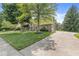 A beautiful house with a well-maintained lawn and an inviting driveway at 8712 Admirals Bay Dr, Indianapolis, IN 46236