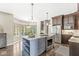 Modern kitchen featuring an island, stainless steel appliances, and ample counter space, perfect for cooking at 8712 Admirals Bay Dr, Indianapolis, IN 46236
