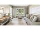 Comfortable living room featuring large windows, a neutral color palette, and stylish furnishings at 8712 Admirals Bay Dr, Indianapolis, IN 46236