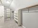 Bright walk-in closet featuring white shelving, providing ample storage space at 8712 Admirals Bay Dr, Indianapolis, IN 46236