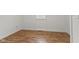 Bright room showcasing laminate flooring and shiplap walls at 89 S Grant St, Martinsville, IN 46151