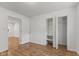 This bedroom showcases a closet with wood-look floors and neutral paint at 89 S Grant St, Martinsville, IN 46151