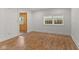 Bright bedroom with laminate floors and fresh white walls at 89 S Grant St, Martinsville, IN 46151