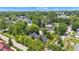 Aerial view of a neighborhood with mature trees, offering a serene and established residential environment at 900 W Busby St, Lebanon, IN 46052