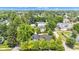 Aerial shot of a home nestled among lush greenery, showcasing its tranquil and private setting at 900 W Busby St, Lebanon, IN 46052