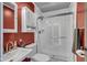 Cozy bathroom with white vanity, toilet, and a glass-enclosed shower, providing a clean and functional space at 900 W Busby St, Lebanon, IN 46052