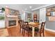 Elegant dining room with hardwood floors and a cozy fireplace at 900 W Busby St, Lebanon, IN 46052
