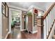 Inviting foyer featuring hardwood floors, staircase, and entry to living room at 900 W Busby St, Lebanon, IN 46052