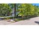 Well-maintained home with an American flag, tidy landscaping, and a driveway leading to an attached garage at 900 W Busby St, Lebanon, IN 46052