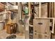View of the furnace and surrounding HVAC equipment in the basement at 900 W Busby St, Lebanon, IN 46052