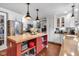 Bright kitchen with a butcher block island, stainless appliances, and ample storage space at 900 W Busby St, Lebanon, IN 46052
