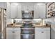 Modern kitchen featuring stainless steel appliances, stylish countertops, and ample cabinet space at 900 W Busby St, Lebanon, IN 46052