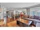 Open-concept living room and dining area with hardwood floors and a cozy, neutral color palette at 900 W Busby St, Lebanon, IN 46052