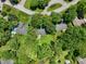 Aerial view of a property with mature trees and a defined boundary line at 9014 Holliday Dr, Indianapolis, IN 46260